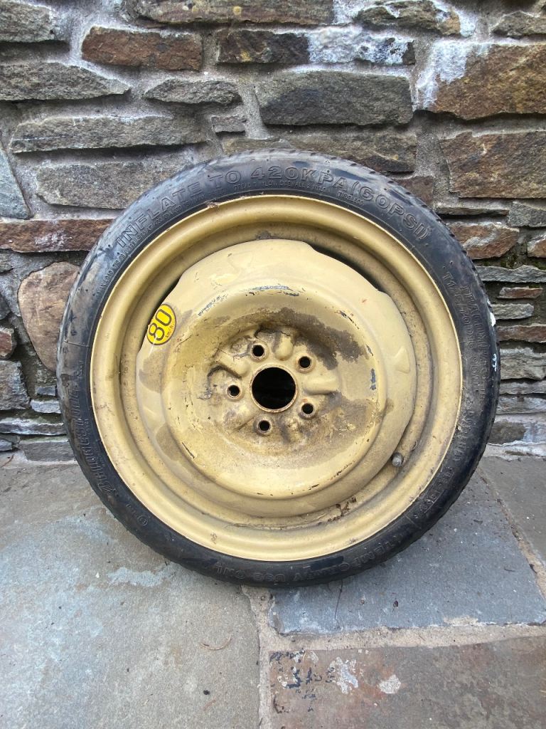 Spare wheel.      T125/70 D16