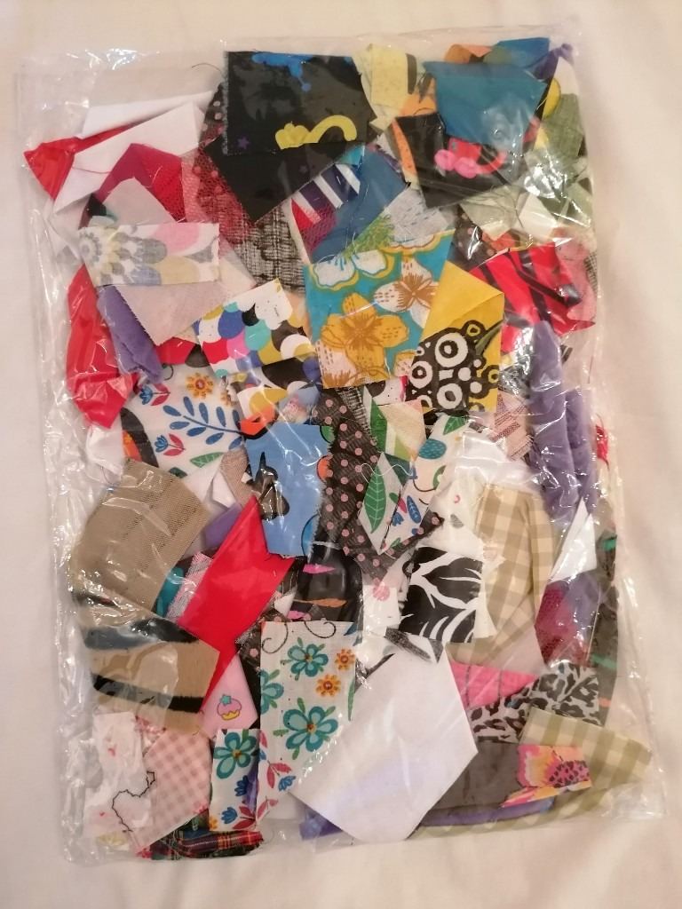 Large bag of fabric scraps cut into strips for art craft or school project london e8 1eb