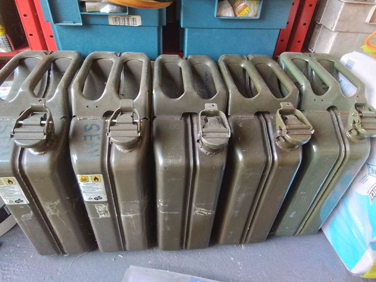 Five 20L military, metal jerry cans, all in very good used condition, with brand new metal spout.