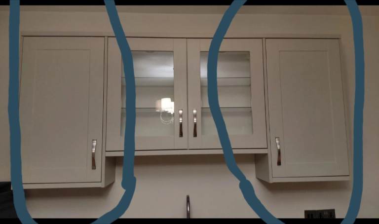 2 x tall Howdens kitchen wall cupboards with lighting