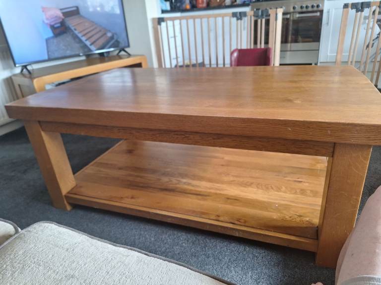 Large solid oak coffee table.