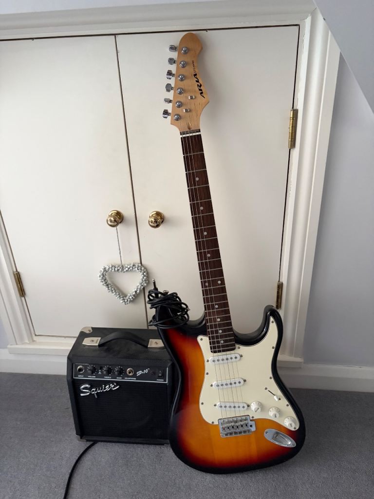 Aria STG-Series Electric Guitar & Squier SP-10 Amp