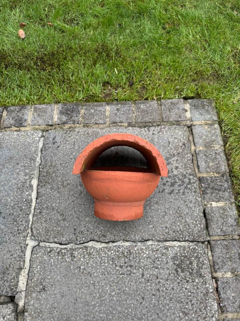 Bonnet hood chimney pot.