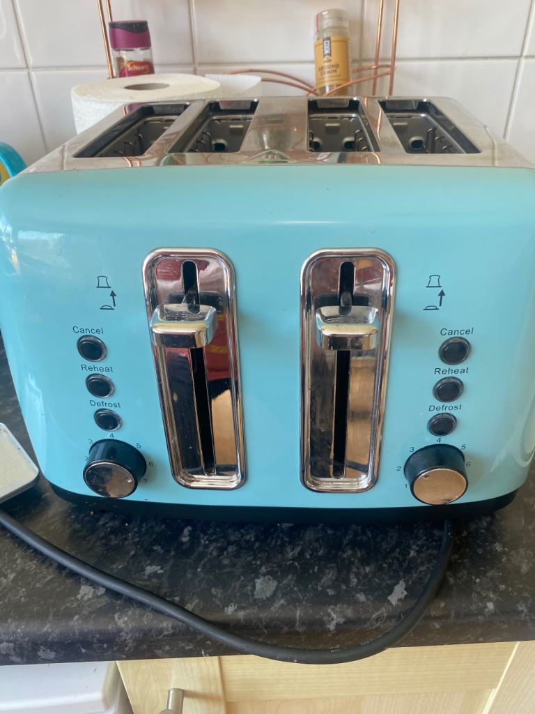 Blue colour double toaster like new cost £50 only used a few times 