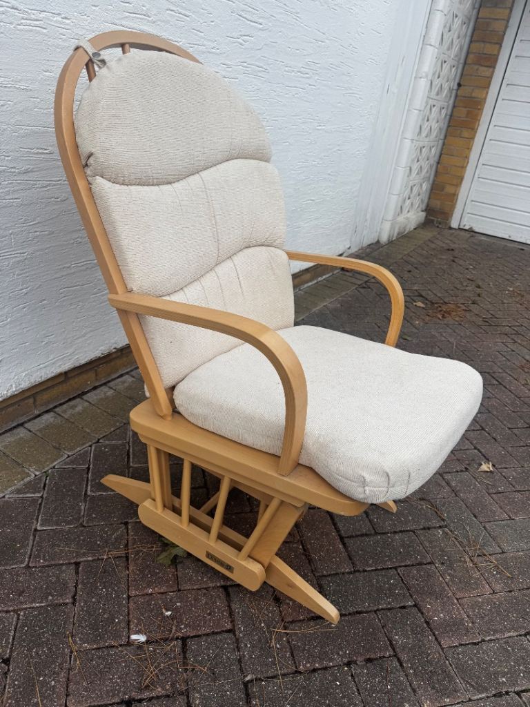 Comfortable Wooden Rocking Chair with Beige Cushions