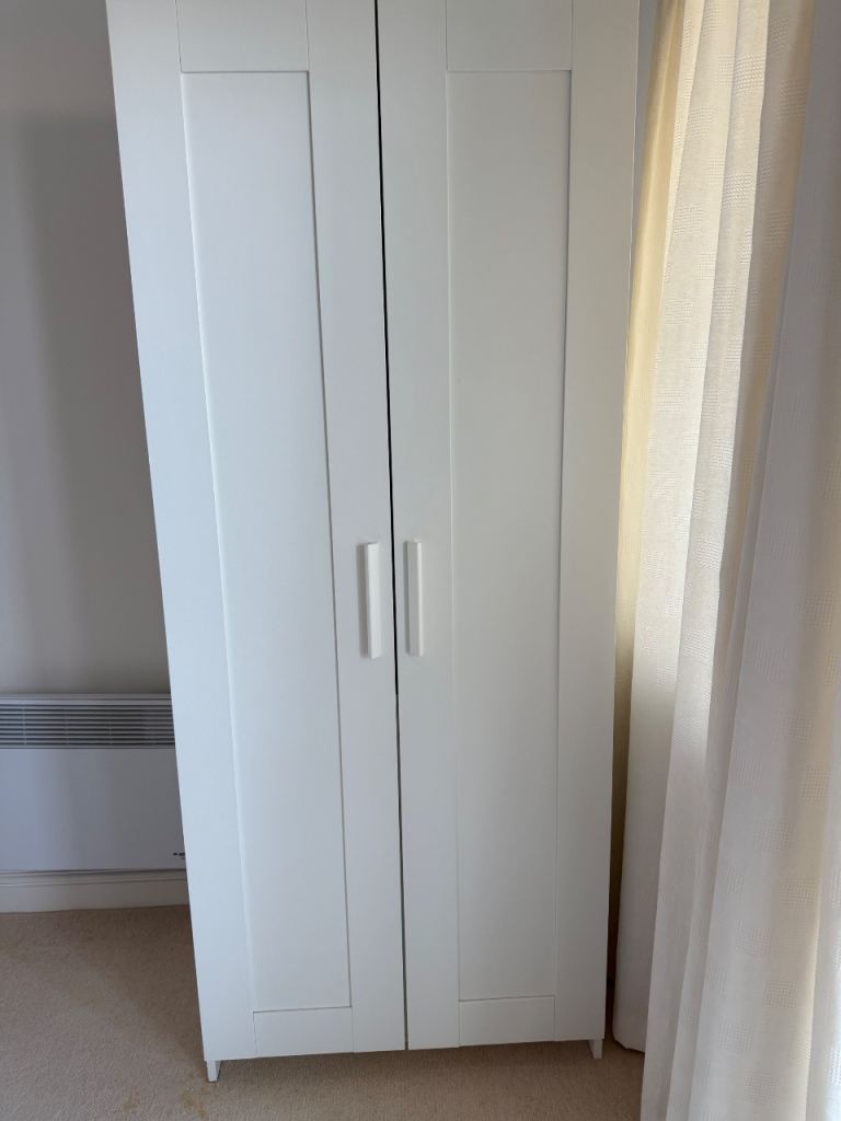 White assembled IKEA double wardrobe
