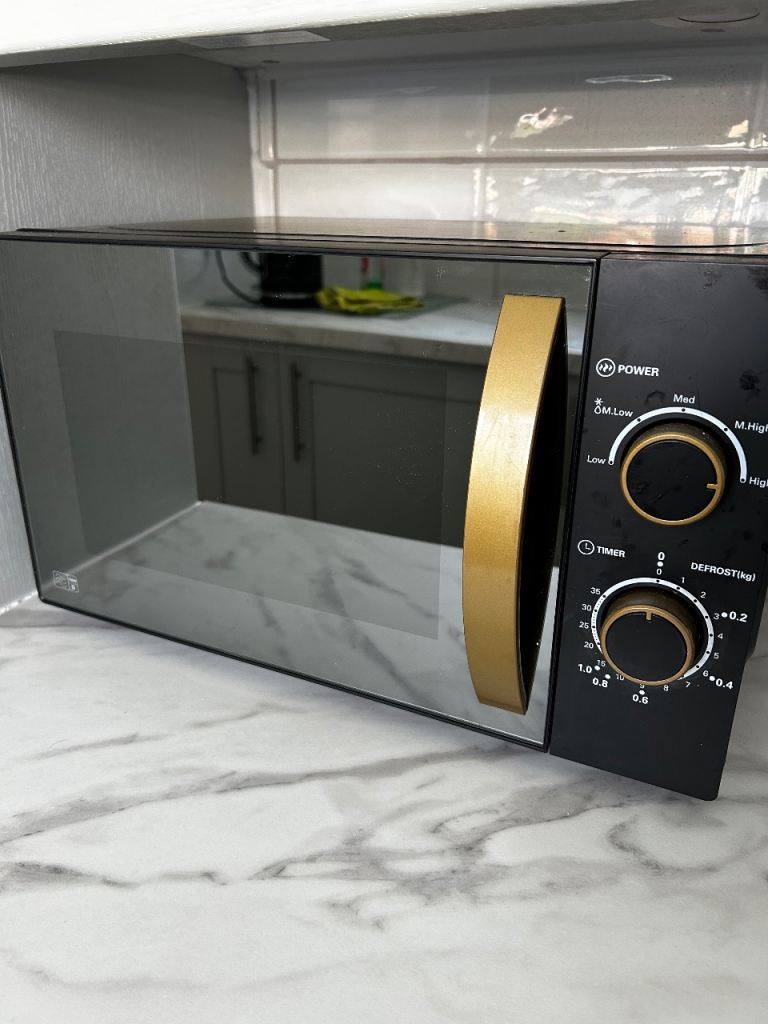 Black Microwave with Gold Handle – Good Condition