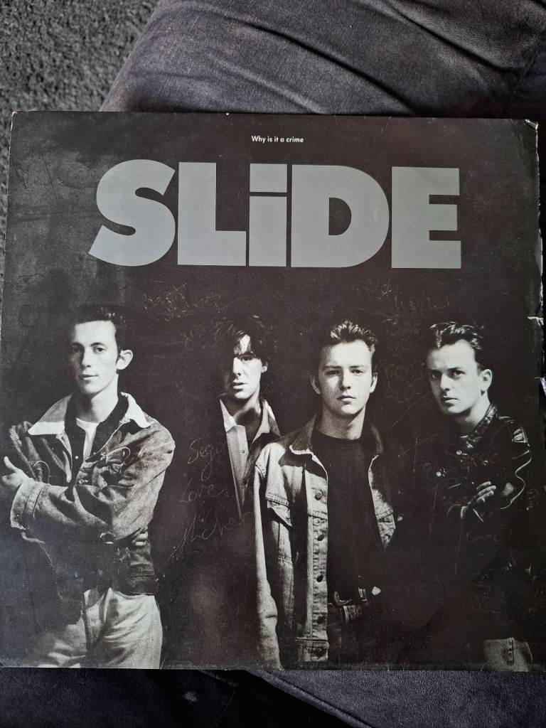 12 inch single vinyl Why is it a Crime by Slide