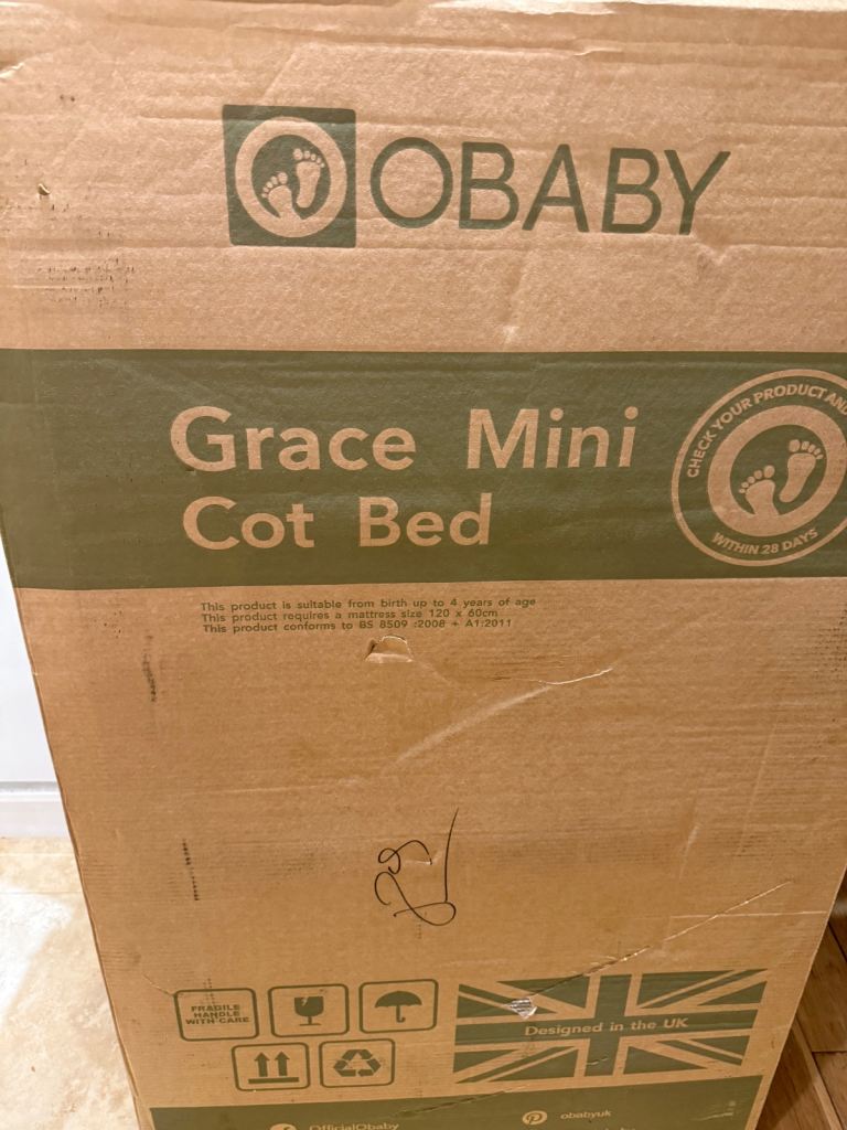 Brand new still in box mini cot bed 