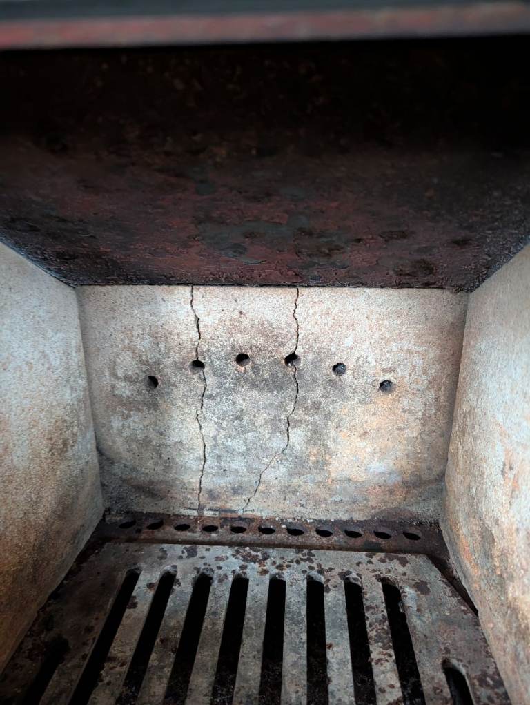 Redfyre "Kensal 33"Cast iron multifuel log/solid fuel fire. 4.9 kW    W 47cm  H 54cm  D 31cm 