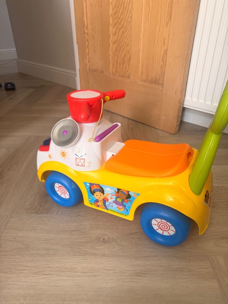 Little people ride on music trike 