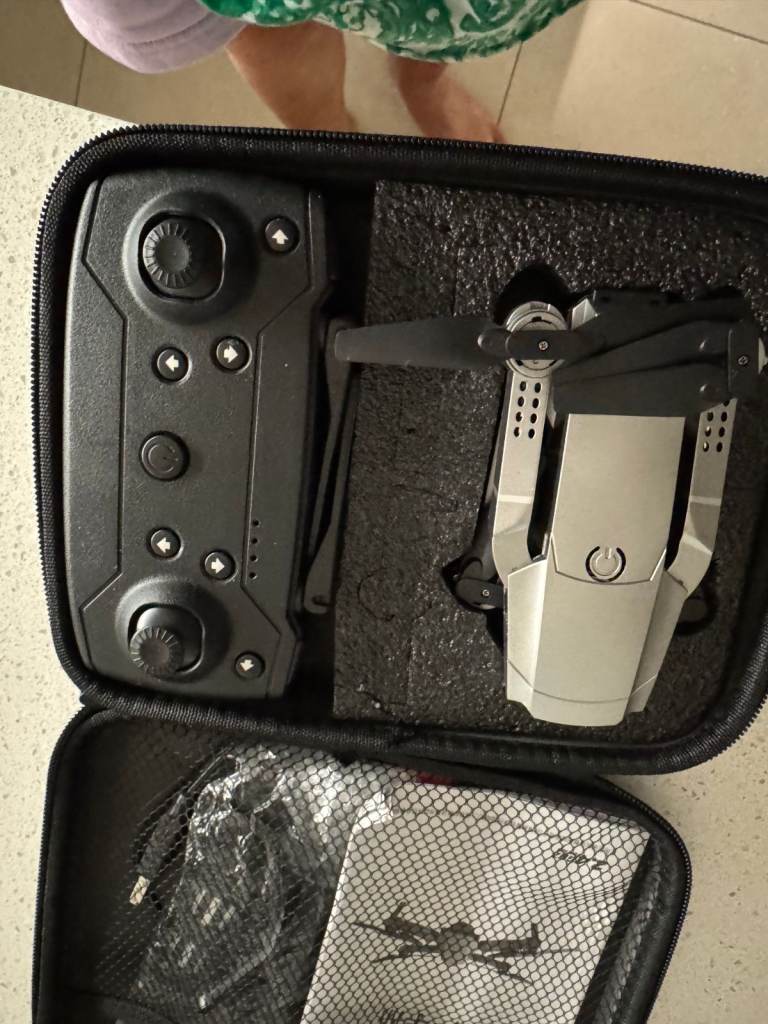 Compact Silver Drone with Controller and Case – As Good As New