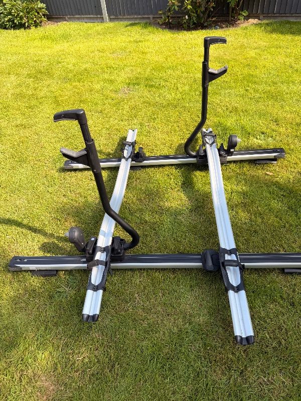 Thule roof bars and 591 pro ride carrier bike holder x2 and Thule foot pack x 4 