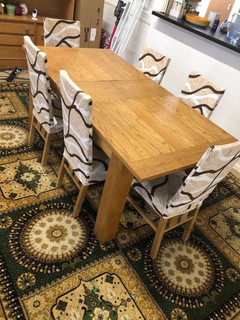 Solid Wood Extendable Dining Table for sale + 6 Chairs (free) – Seats 6