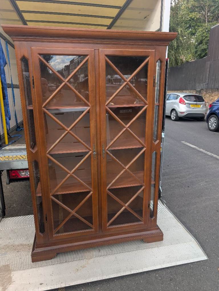 Solid Wood Display Cabinet with Glass Doors – Good Condition - can deliver free