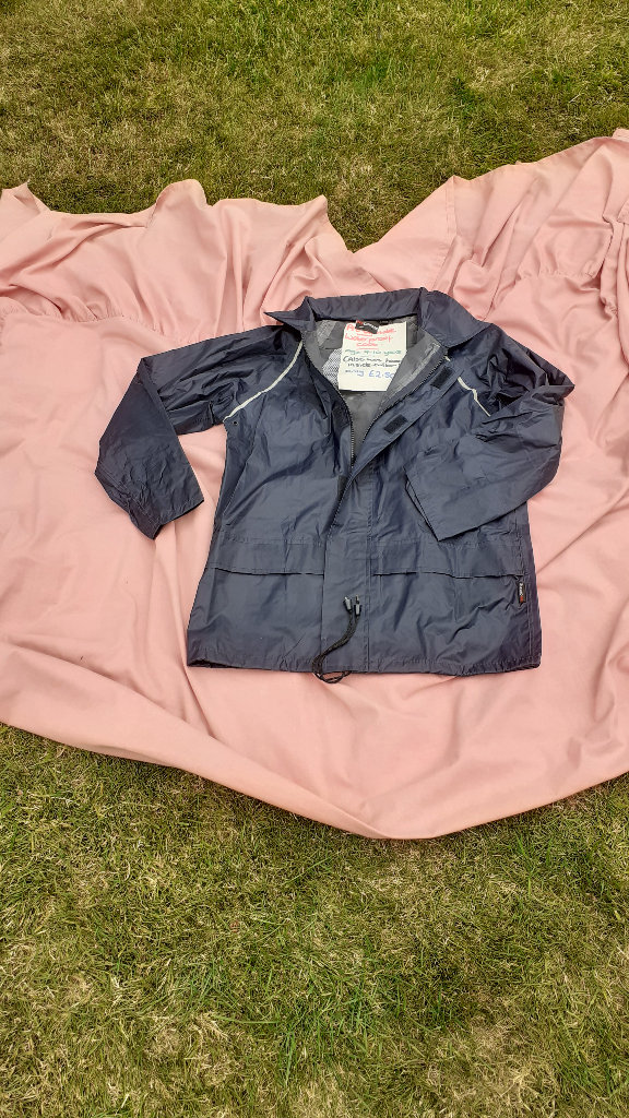 Pro Climate waterproof coat, girls age 9-10 years.