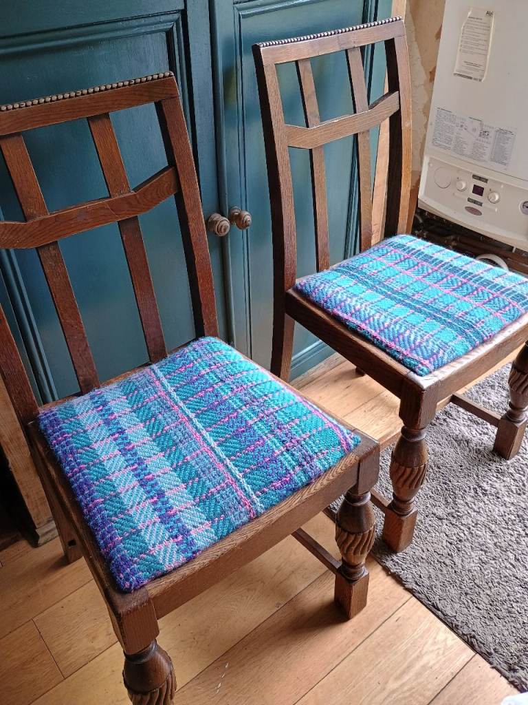 Pair of oak arts & crafts style dining room chairs with hand woven seat covers