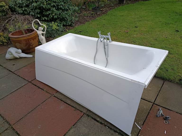 1800 x 800 bath with shower mixer tap. White sink for vanity with taps.. 