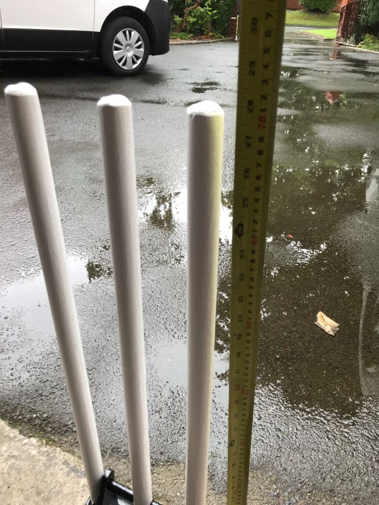 Vintage Spring Back Cricket Stumps on a Cast Iron Base, refurbished great condition