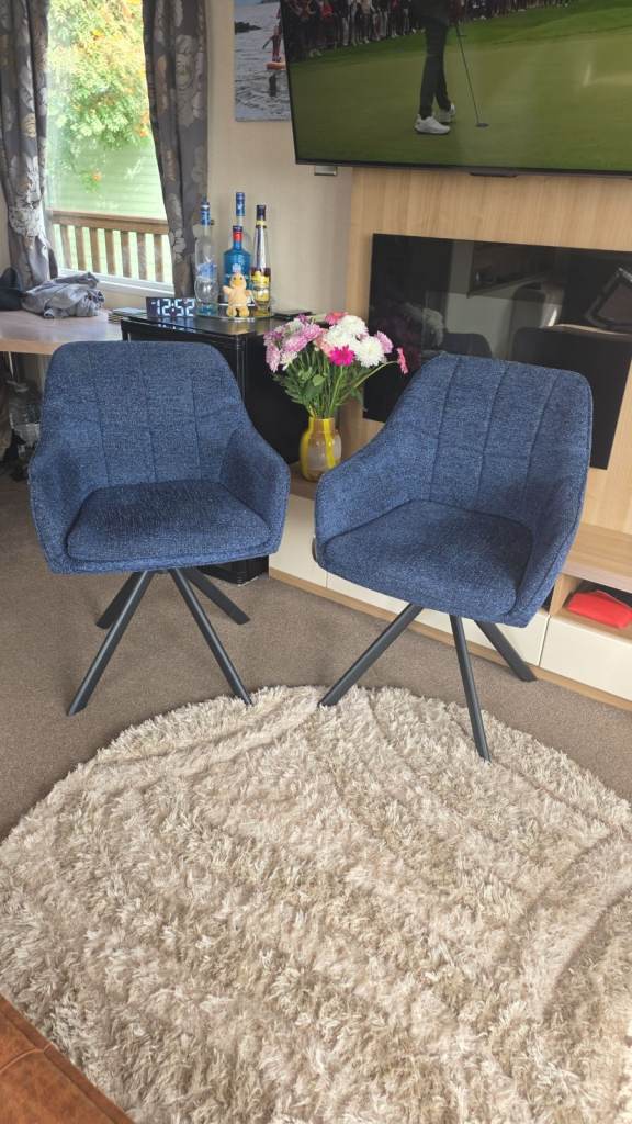 Pair of Blue Fabric Dining Chairs with Swivel Base