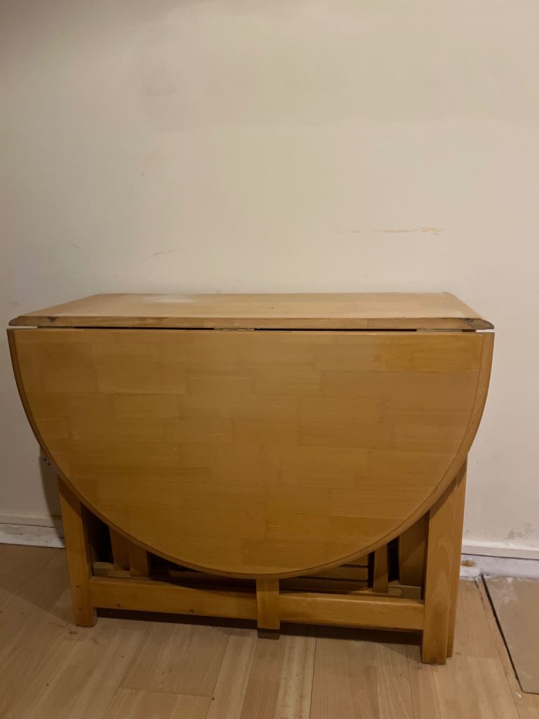 Compact Wooden Fold-Away Dining Table with Storage