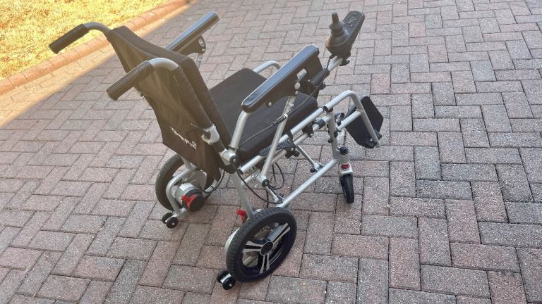 Electric Wheelchair - Lightweight, Foldable, As Good As New