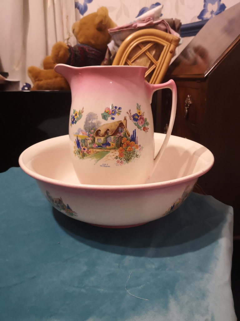 a lovely old fashioned wash bowl and water jug