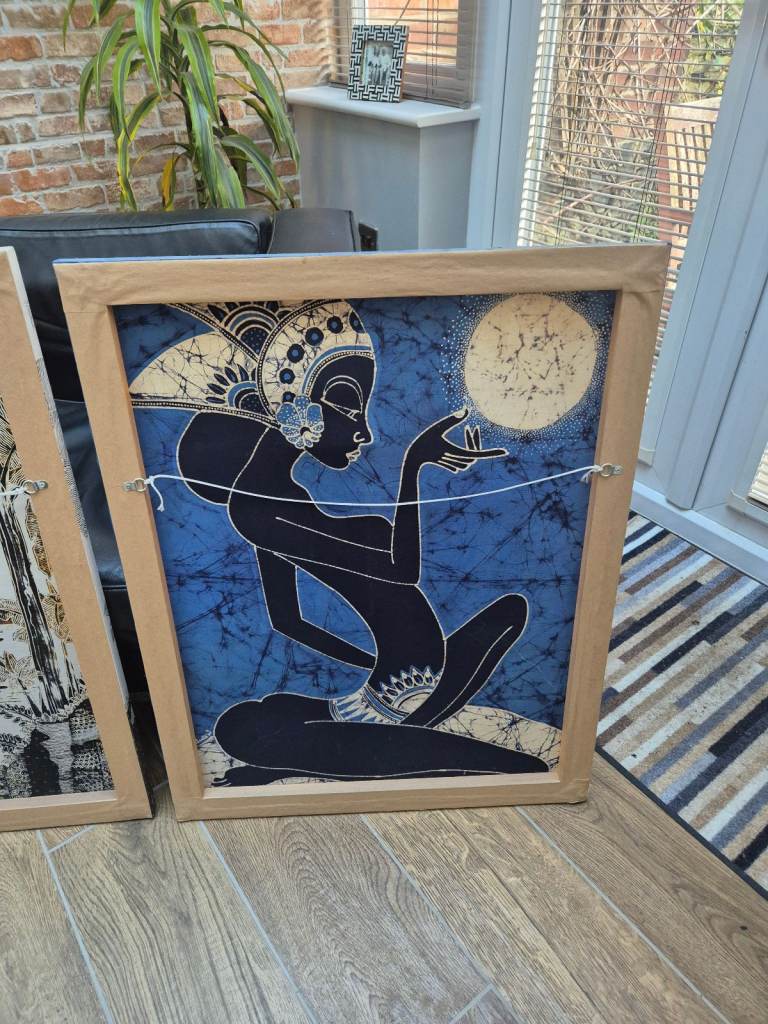 Four batik pictures on wooden frames