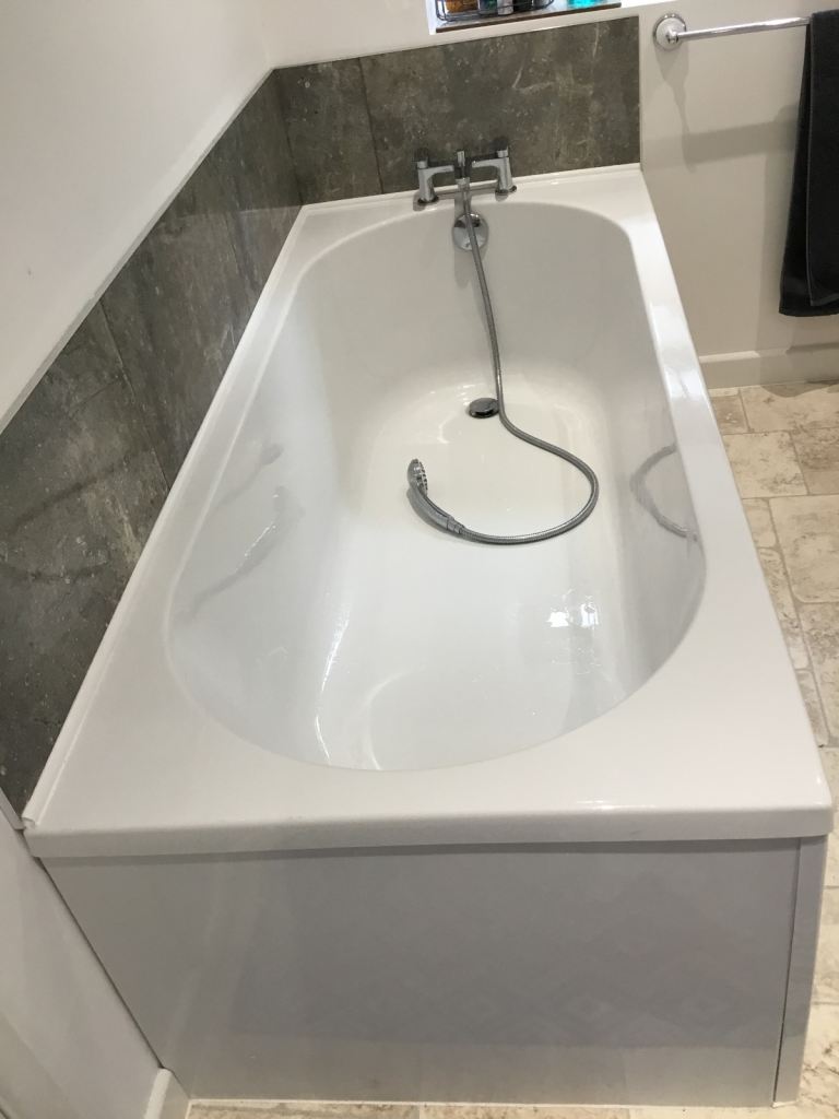Full size acrylic bath for sale.
