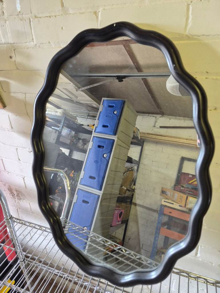 Black Wavy Edge Wall Mirror – Good Condition