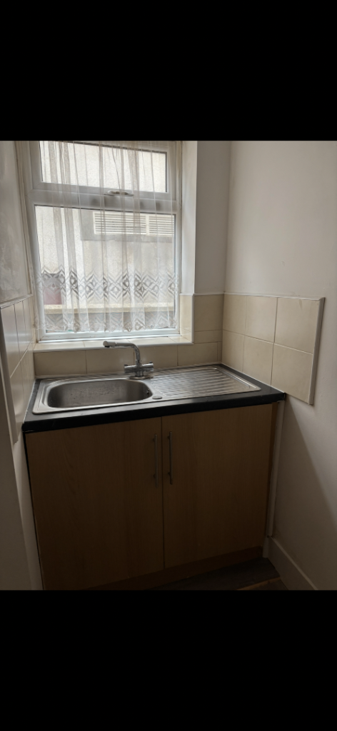 Studio flat with shop front