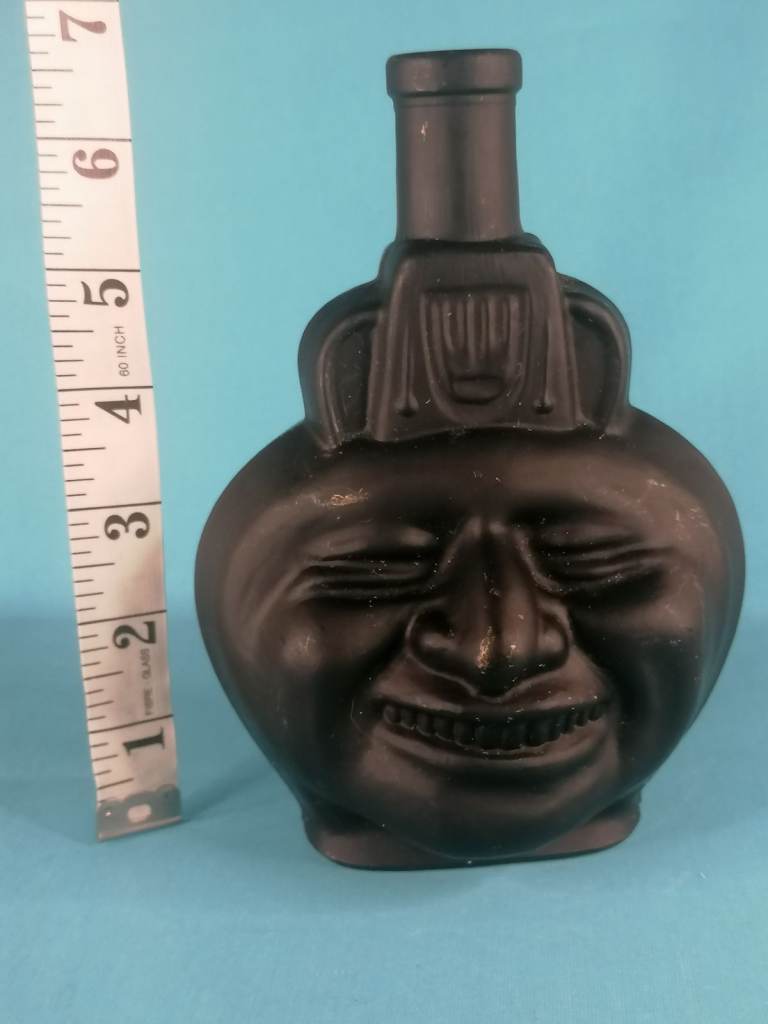 Vintage Bottle Tiki Face Black Matte Lima, Collectible Bottle. As seen. Good condition.