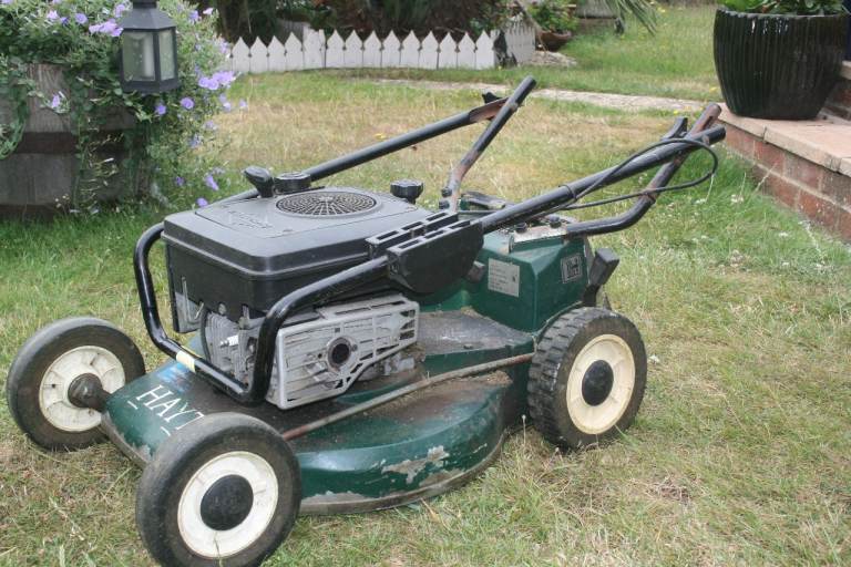 Free petrol Lawnmower and Slingsby trolley