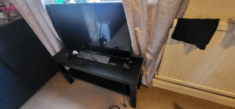 Black TV stand Good Condition 