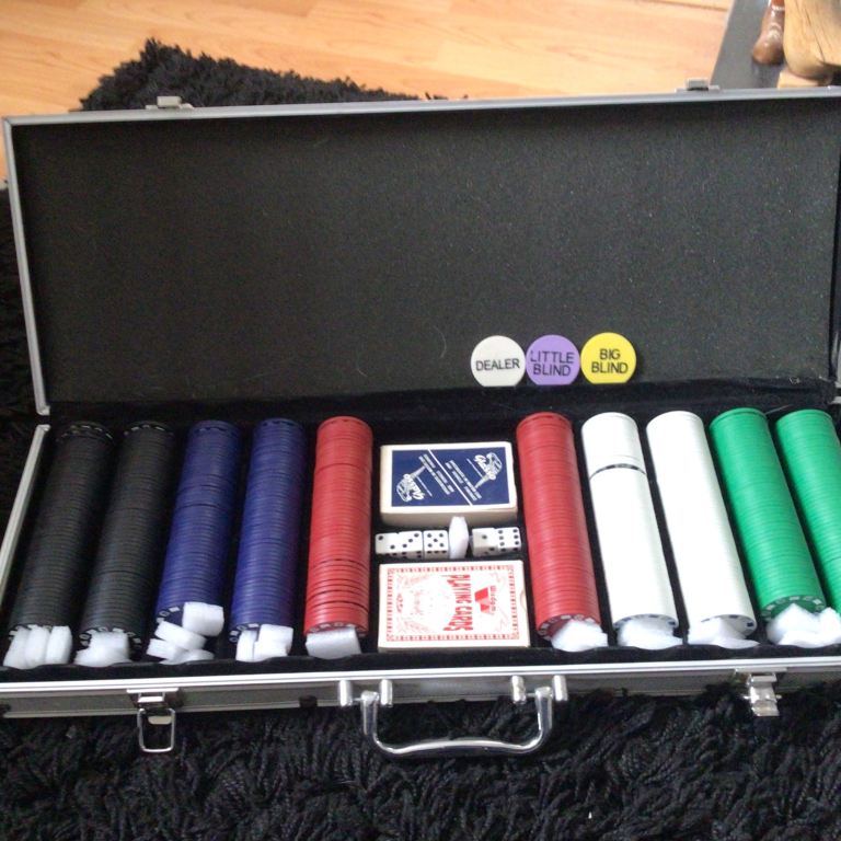 Poker chips set in a metal case £30