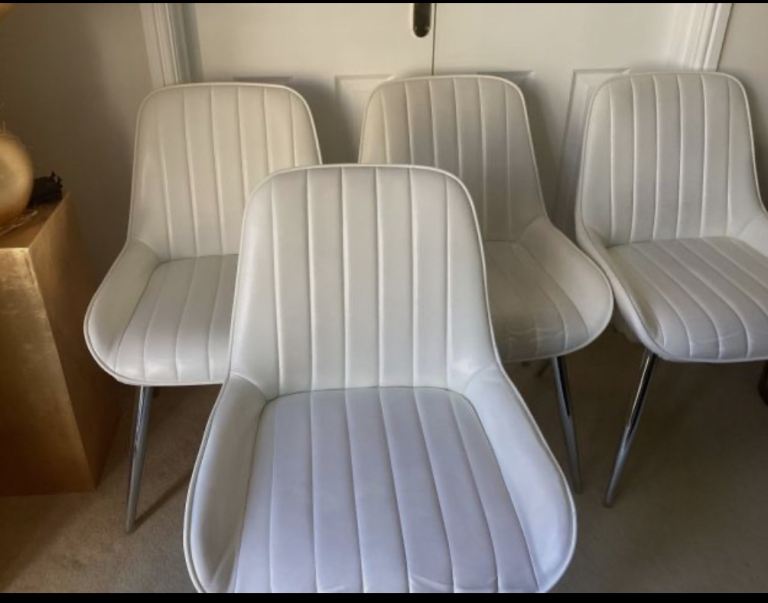 6 white padded dining or kitchen chairs with silver chrome legs 