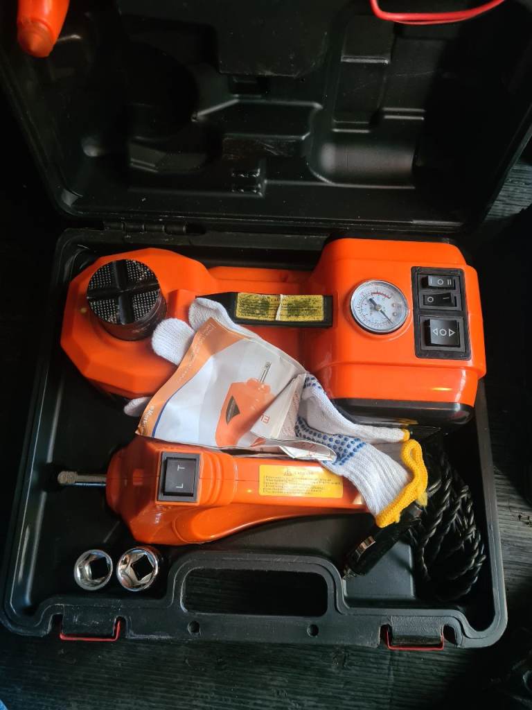 Electric Jack Lift and tyre inflator. Not getting used. Comes with buzz gun etc.