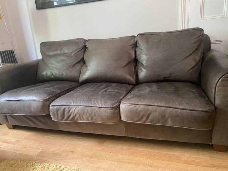 Comfortable Brown Leather  four-Seater Sofa – Good Condition