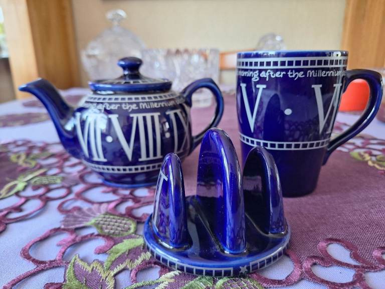 Millennium Themed Blue Ceramic Teapot, Mug, and Toast Rack Set