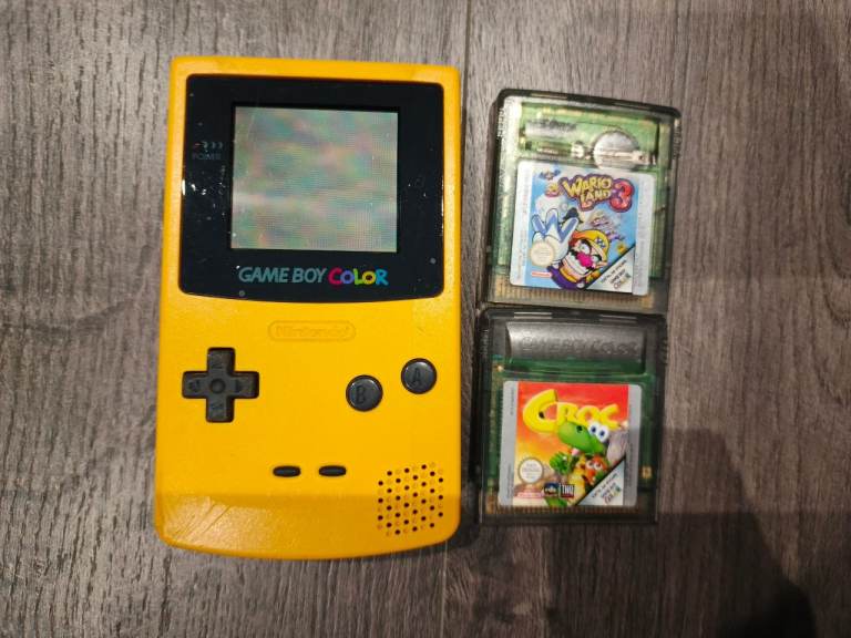 Classic Nintendo Game Boy Color in Yellow with Two Games
