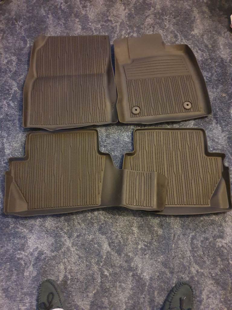 Ford Fiesta/Puma genuine tray type rubber mats.