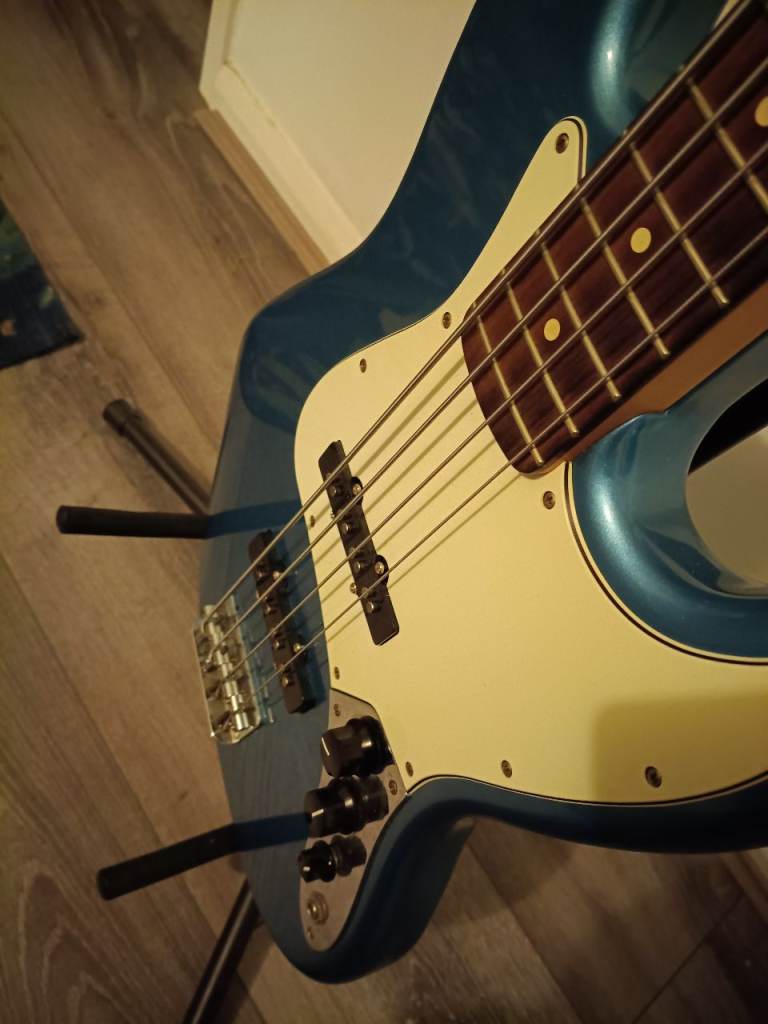 Fender Jazz bass in Lake Placid blue with Fender hard case, pickup upgrade