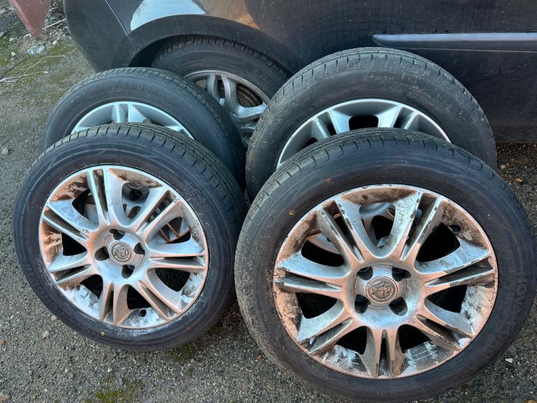 Corsa 2011 wheels x4 new tyres 