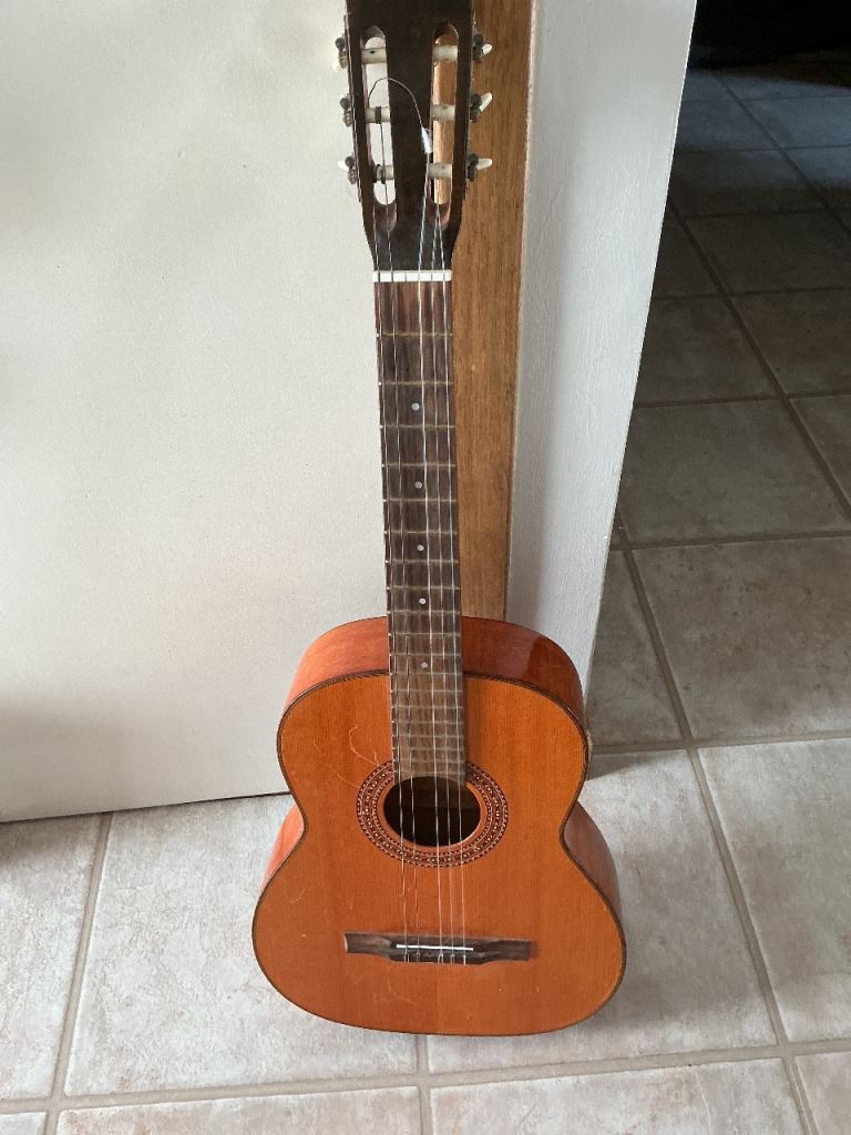 Beginners guitar needs a bit of  TLC 