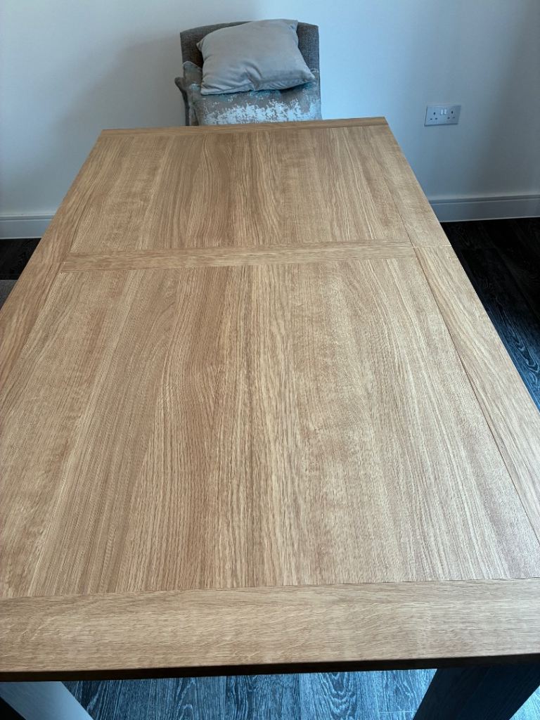 Next Malvern dove grey extendable table with 6 next chunky weave grey and wooden leg chairs 