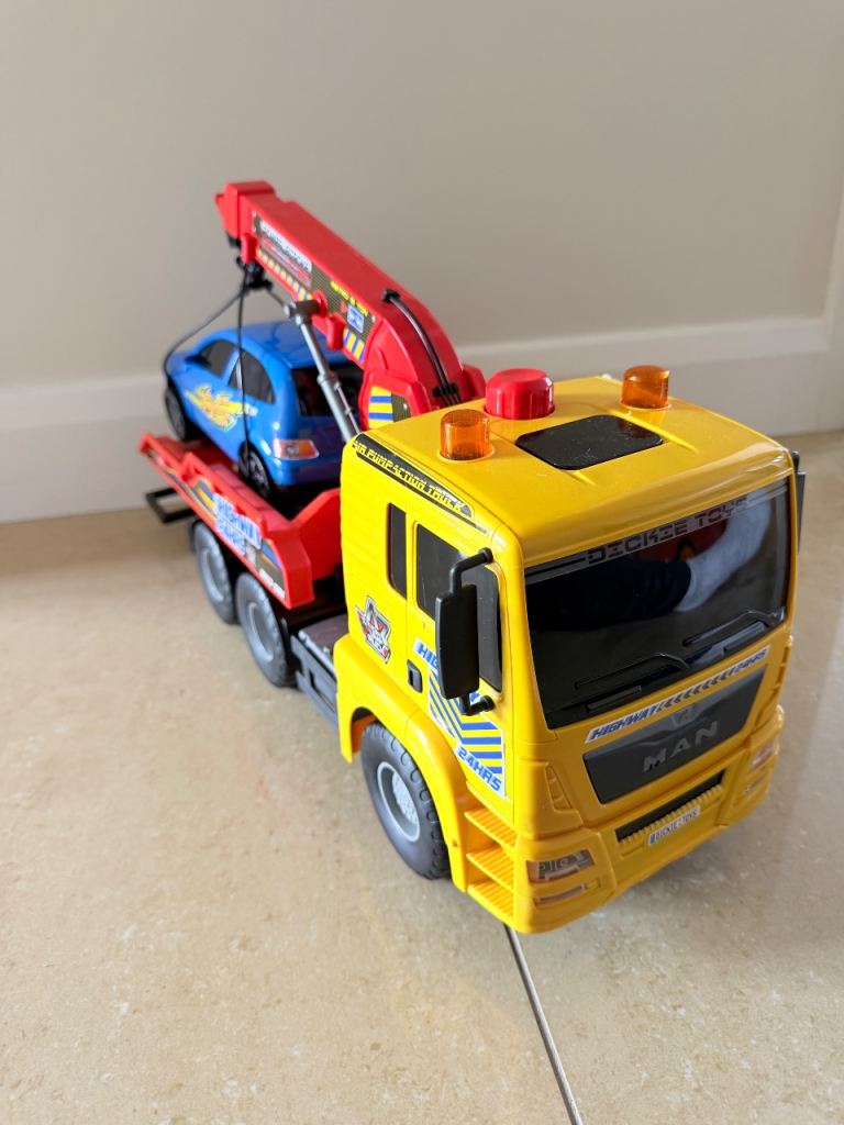 MAN Tow Truck Toy with Blue Car – Good Condition