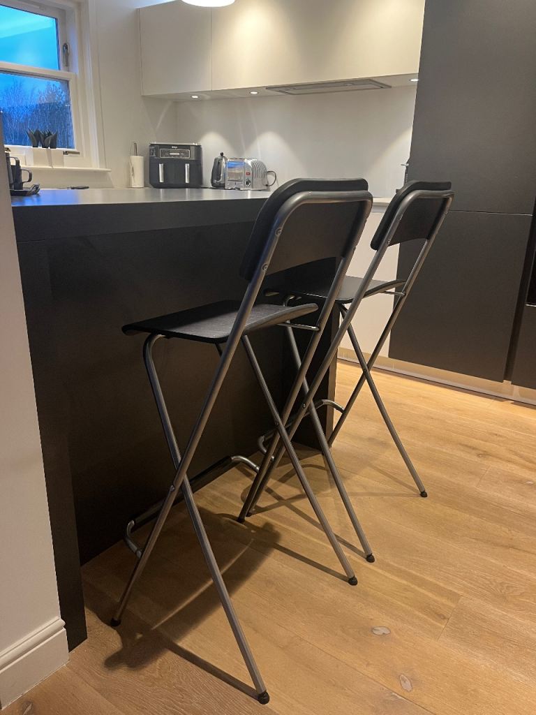 2 ikea FRANKLIN bar stool, foldable in black with stainless steel legs 