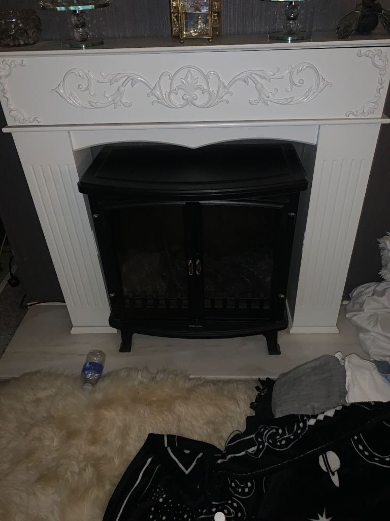Full set up , marble health , electric fire and surround 