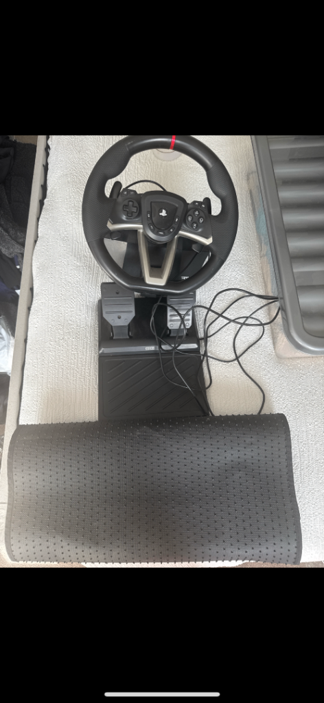 HORI Racing Wheel APEX steering wheel and pedals for PlayStation.