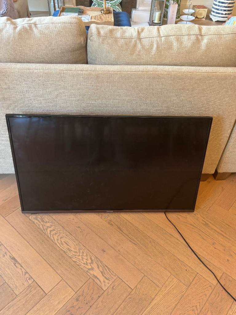Black Flat Screen TV – Good Condition